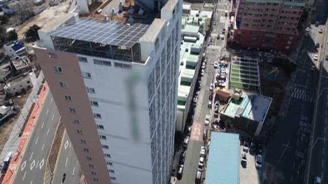 Panoramic View of High-rise Urban Efficiency Apartment and Windows