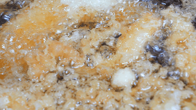 Various foods fried in hot oil