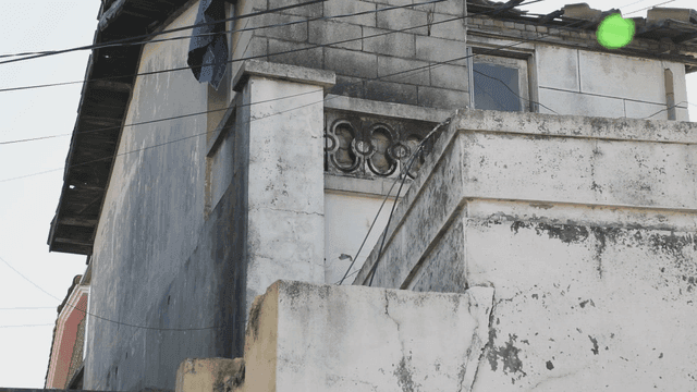 Old residential building with weathered facade
