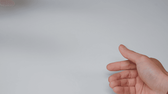 Hands exchanging Korean and US currency