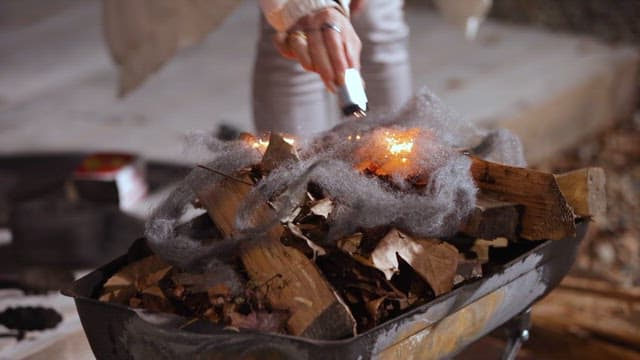 Scene of Igniting a Firewood at Night
