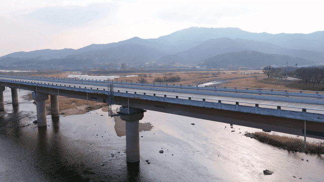 Bridge over mountain and river