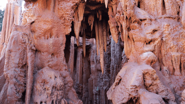 Stalactites in a colorful cave