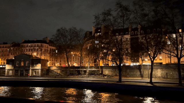 Night view of European city with lit-up buildings