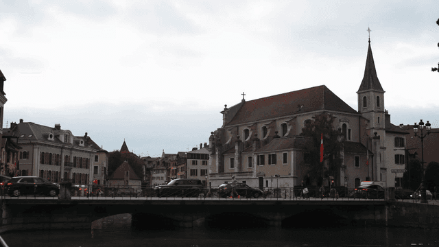 View of European bridge road and church