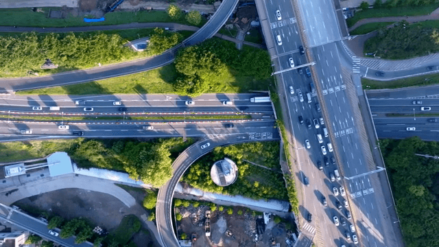 Busy highway intersection with cars