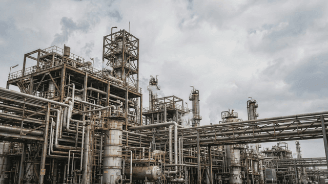 Industrial factory with complex pipes.