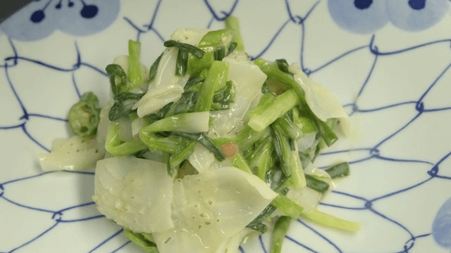 Fresh vegetable salad on a patterned plate