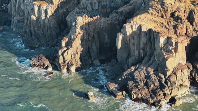 View of Rocky Seashore with Waves