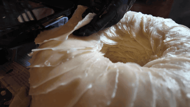 Round, generously piled on top of wheat pancakes