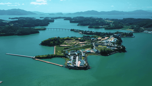 A scenic island with surrounding waters