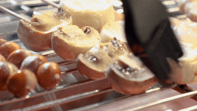 Brush with oil to skewer mushrooms and vegetables