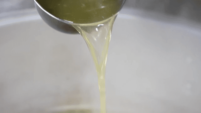 Ladle for pouring broth into pot