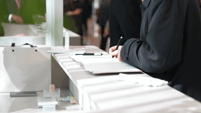 Person who writes guest book at wedding hall