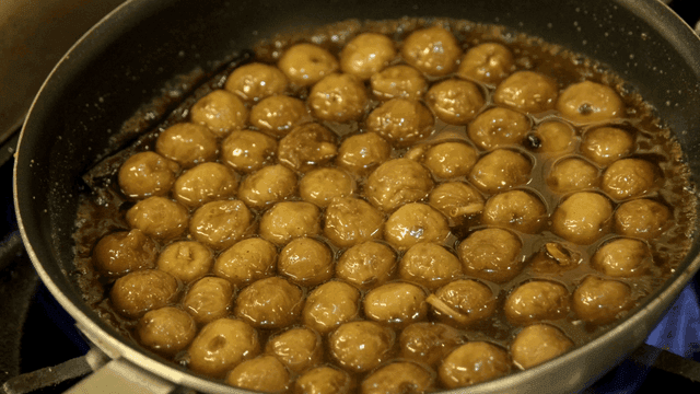 Figs being simmered in sweet syrup