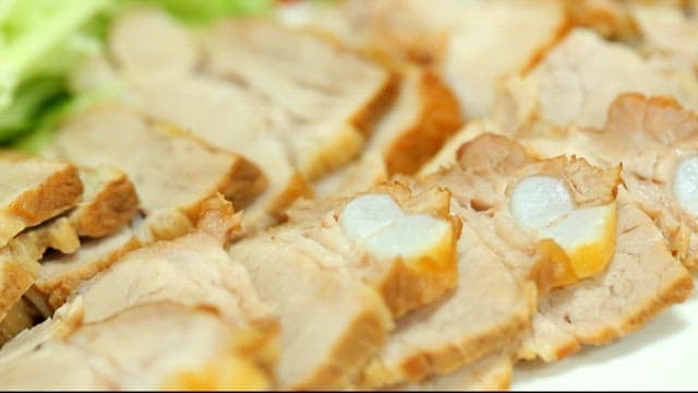 Sliced boiled pork with cucumber and sliced raw pollack salad