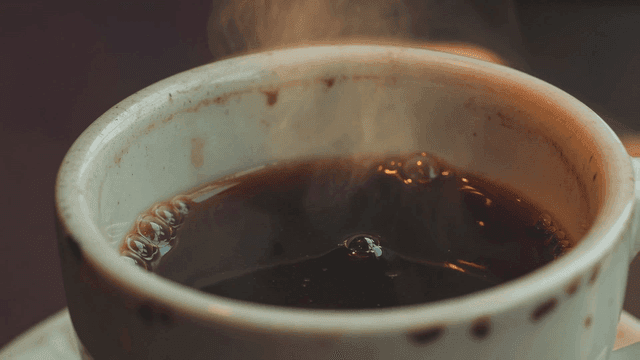 Steaming hot cup of coffee