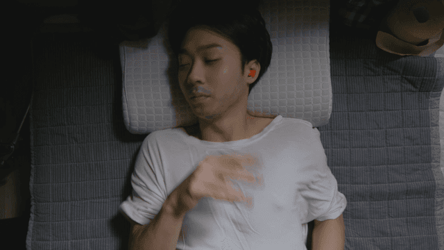 Man sleeping peacefully indoors