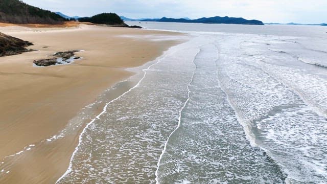 Serene beach with gentle waves