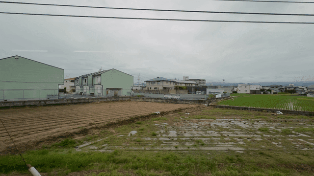 Countryside scenery with fields and houses