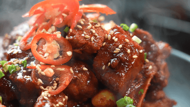 Spicy braised short ribs with sesame and chili