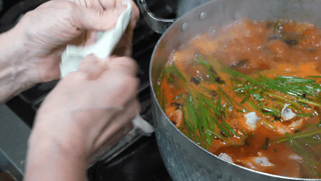 Spicy handmade dumplings made by tearing off dough