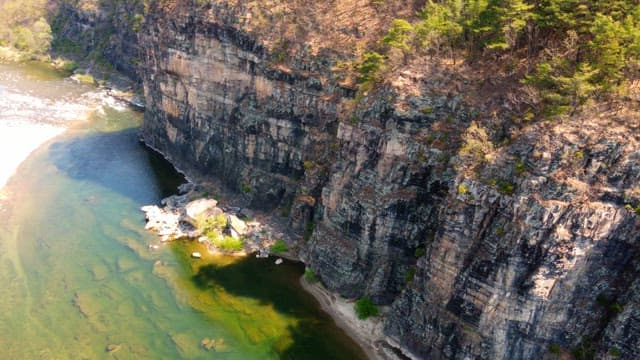 Scenic cliffside with a river below