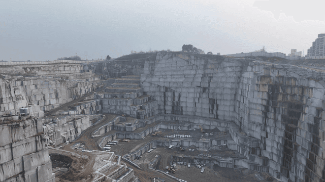 Large quarry with terraced rocks