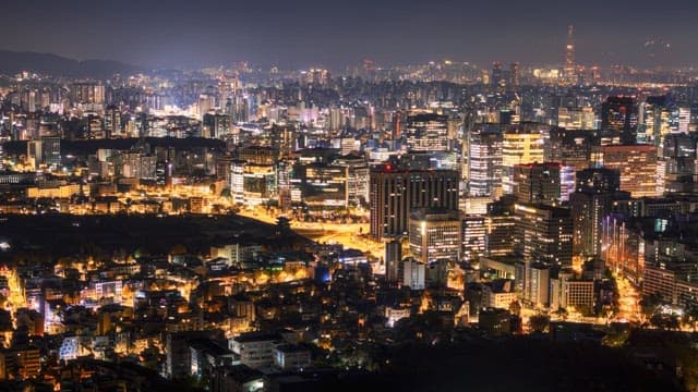 Cityscape timelapse from night to sunrise