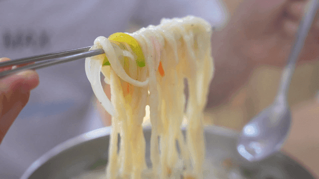 Chewy hand-cut noodles eaten with chopsticks