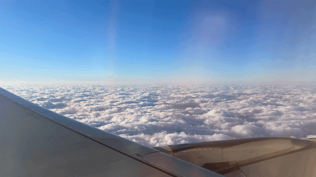 View of clouds from an airplane window