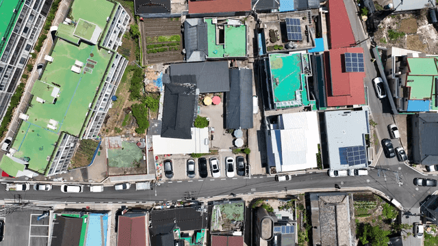 Aerial view of residential area with colorful roofs