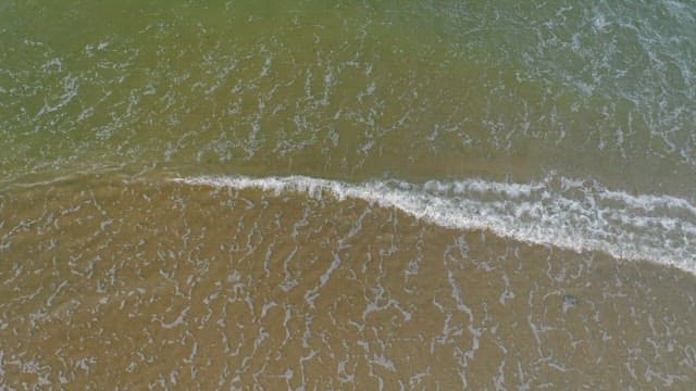 Serene Beach View with Gentle Waves