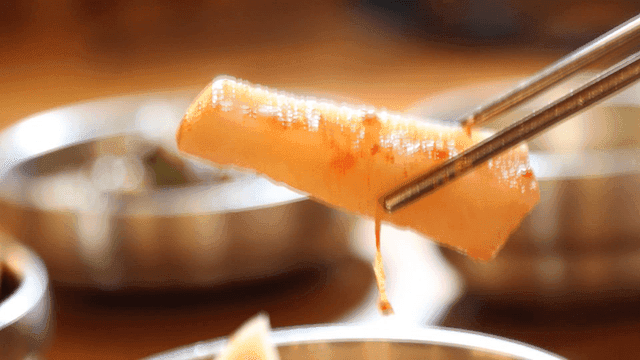 Kimchi picked up with chopsticks