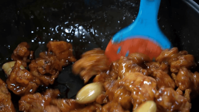 Chicken gangjeong with sauce on pan