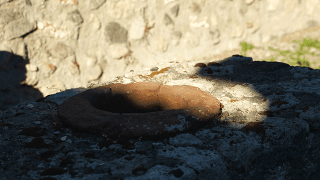 Old stone structure with sunlight