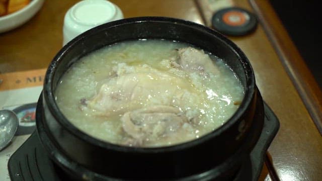 Chicken Porridge Served in a Stone Pot