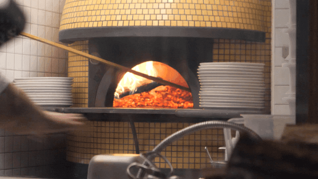 Pizza in wood-fired oven