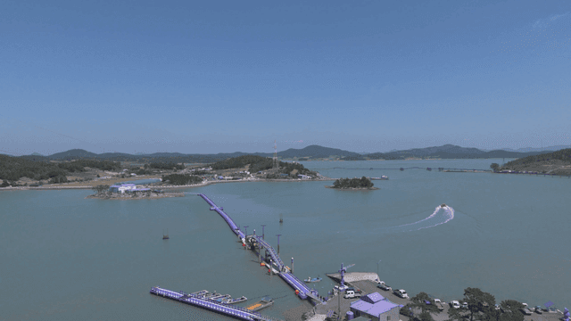 Purple bridge and coastal scenery