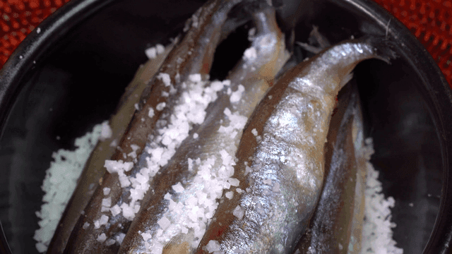 Salted fish arranged in a pot