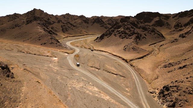 Winding road through a desert landscape