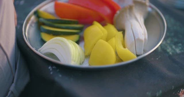 Fresh Vegetables Being Prepared for a Meal on the Plate