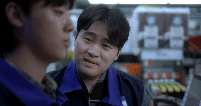 Two clerks talking in store