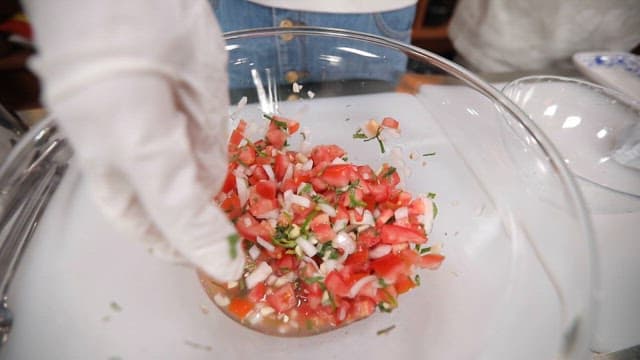 Fresh Ingredients for a Homemade Salsa in a Glass Bowl