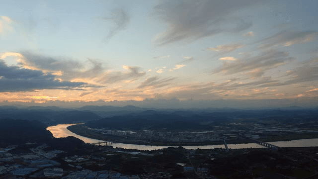 River flowing through the village and sunset