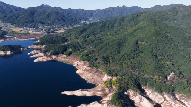 Scenic mountain landscape with a tranquil lake