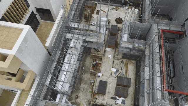 Construction site with scaffolding and workers