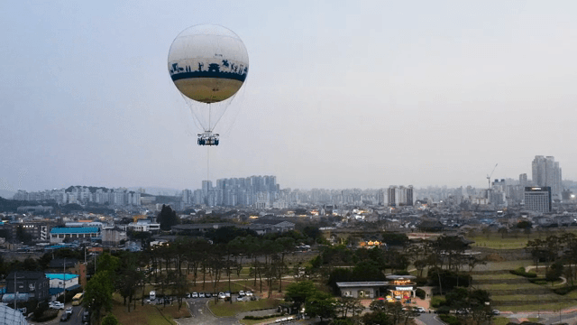 Hot air balloon over a cityscape