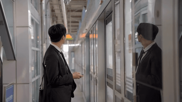 Office worker waiting for the subway