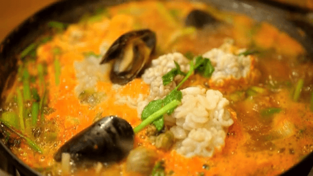 Bubbling pot of Spicy Seafood Stew